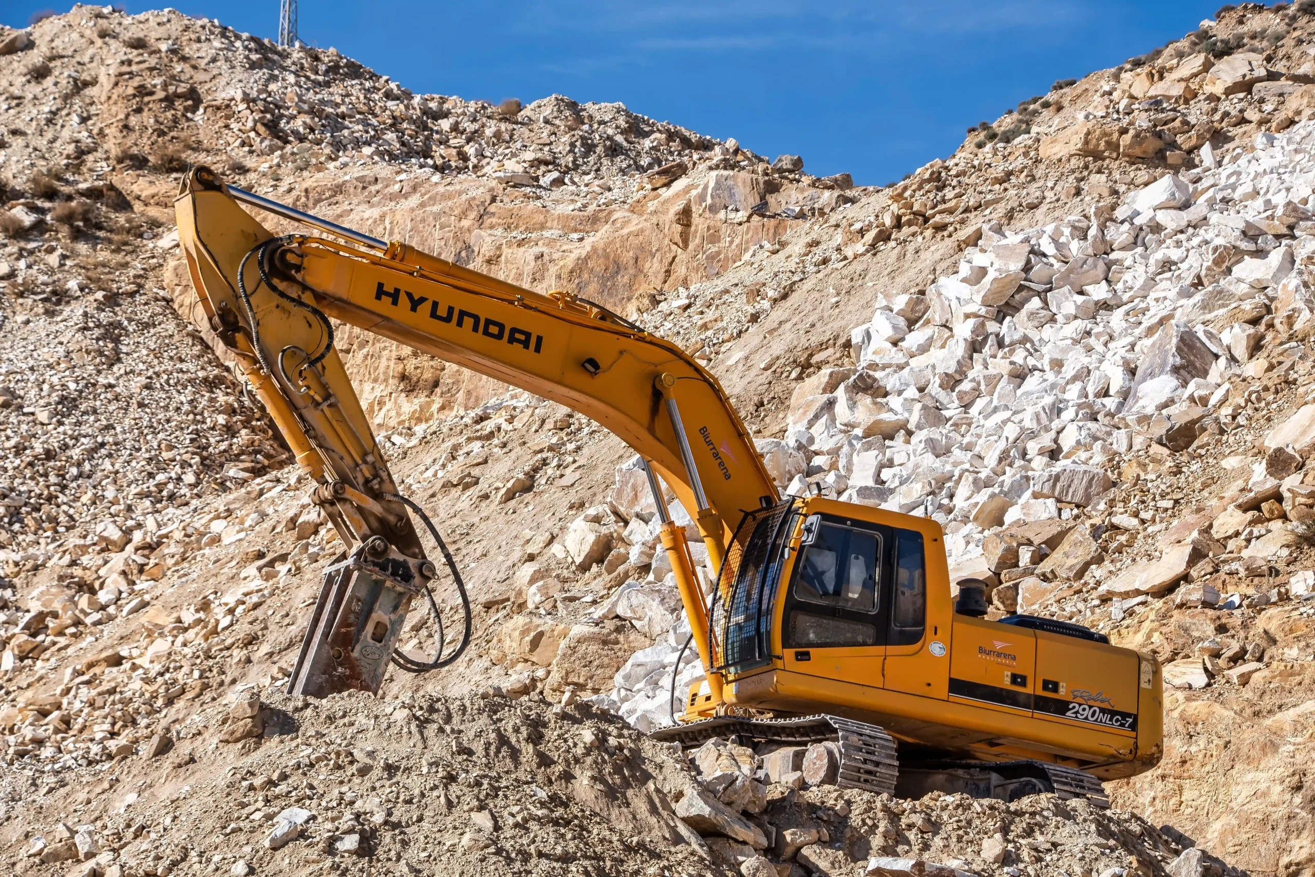 Excavator undercarriage pressure washing in Toronto